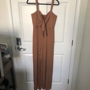 BCBG romper BRAND NEW with tags. Never worn
